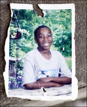 A photograph of slain teen Marquan McCuin when he was about 11 years old.