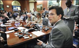House Majority Leader Eric Cantor (R., Va.) speaks to reporters during a pen and pad on Capitol Hill in Washington. 