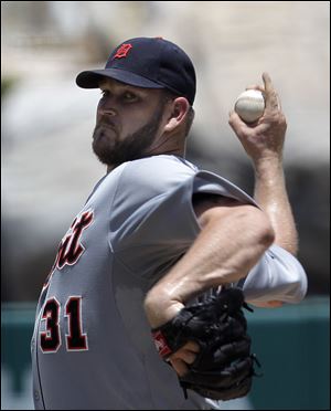 Detroit Tigers starting pitcher Brad Penny throws against the Los Angeles Angels in the first inning of a baseball game in Anaheim, Calif.