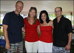 From left, Adam and Kate Fineske with Lela and Mike Rashid at Sylvania Country Club.