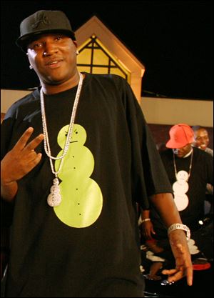 Rapper Young Jeezy gestures while wearing a  T-shirt printed with his trademark snowman, in this 2005 file photo in Atlanta, Ga., released by Island Def Jam Music Group.