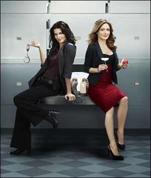 Angie Harmon, left, and Sasha Alexander are the title characters in 'Rizzoli & Isles,' which starts its second season Monday on TNT.