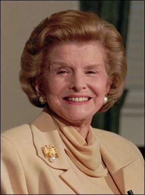 In this1994 file picture, former first lady Betty Ford talks with reporters at the Old Executive Building in Washington D.C. On Friday a family friend said that Ford had died at the age of 93. 