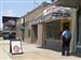Safari-Gems-police-officer-robbery.jpg A police officer is on the scene of a robbery Friday at Safari Gems on Monroe Street.