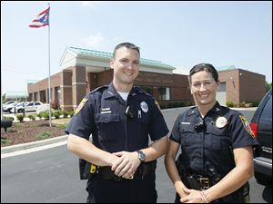 Perrysburg Township police officer David Molter, left, and Sgt. Monica Gottfried are putting together a "senior watch" program for the community's elderly.