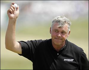 Northern Ireland's Darren Clarke leads the second round of  the British Open Golf Championship at Royal St George's golf course in Sandwich, England.