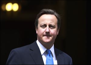 Britain's Prime Minister David Cameron called for an emergency session of Parliament to brief lawmakers on the phone hacking scandal.