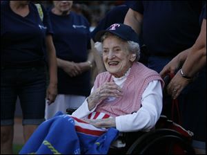 Freda Sackett, 101, enjoys her chance to sing the 'Star-Spangled Banner' with St. Paul Lutheran Church choir.