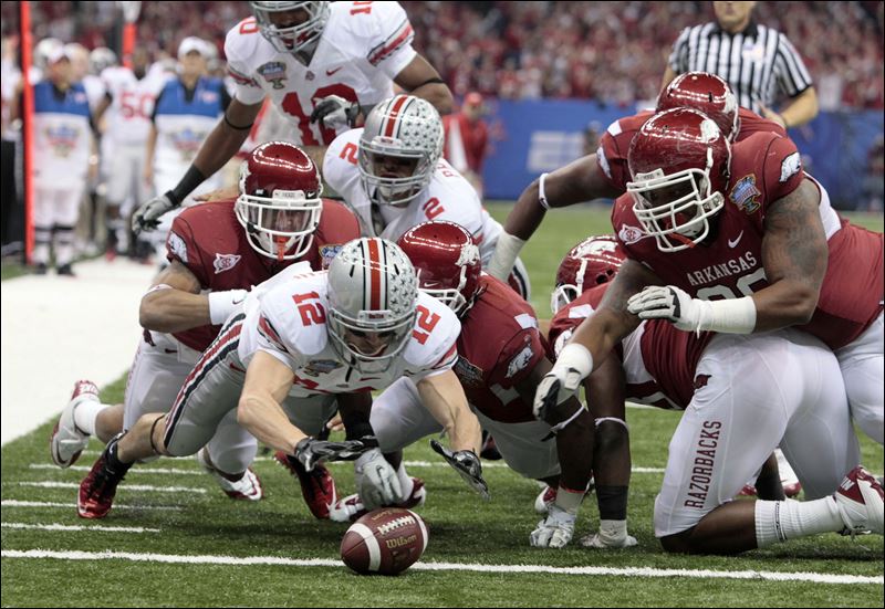 This fumble recovery helped Ohio State defeat Arkansas.