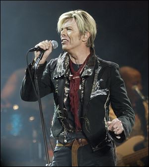 Singer/songwriter David Bowie performs at Madison Square Garden in this 2003 file photo.