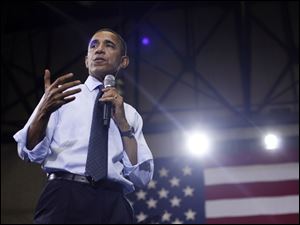 President Barack Obama answers questions Friday during his Town Hall at the Ritchie Coliseum on the campus of University of Maryland.