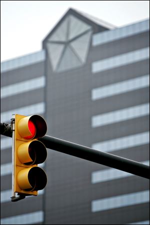 Chrysler, with its logo on its headquarters in Auburn Hills, Mich., is out of government ownership.