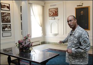 U.S. Army Col. Norvell V. Coots, seen in the main lobby of the Walter Reed Army Medical Center, said staff will go through a natural period of mourning after the closing.