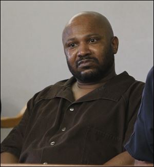 Terrance Taylor, convicted of murder and aggravated robbery after a jury trial, is sentenced to 18 years to life by Judge Stacy L. Cook in the Lucas County Courthouse.