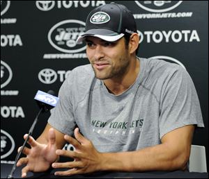 New York Jets quarterback Mark Sanchez speaks to the media during a news conference Tuesday.