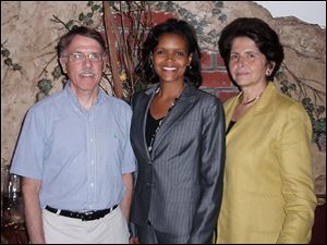 From left, Tom Reed, Marci Cannon-Fisher, and Popi Grecos at the Alliance Francaise de Toledo Bastille Day party.