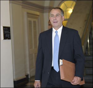 House Speaker John Boehner of Ohio walks to a meeting Thursday on Capitol Hill.