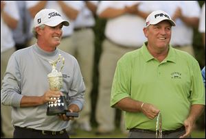 Mark Calcavecchia, right, was the runner up in the British Open. Russ Cochran, left, won the tournament.