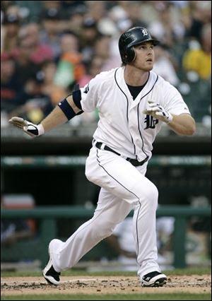 The Tigers' Brennan Boesch watches his solo home run in the first inning of a baseball game against the Los Angeles Angels.