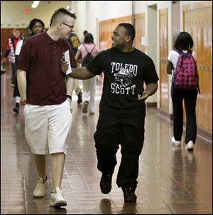 Scott students Hitt Moore DeVilbiss Students Fred Hitt and Denzel Moore walk to class at Scott High School in the old DeVilbiss High School building during building renovations at Scott. 