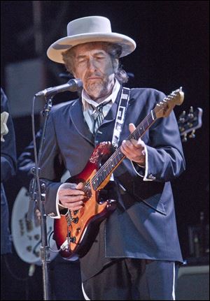 Legendary musician Bob Dylan, shown here at London concert in June, performed Wednesday night at the Toledo Zoo.