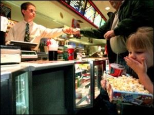 The high cost of concession stand refreshments and snacks might keep moviegoers from frequent visits, but they are necessary to keep theaters updated and profitable.