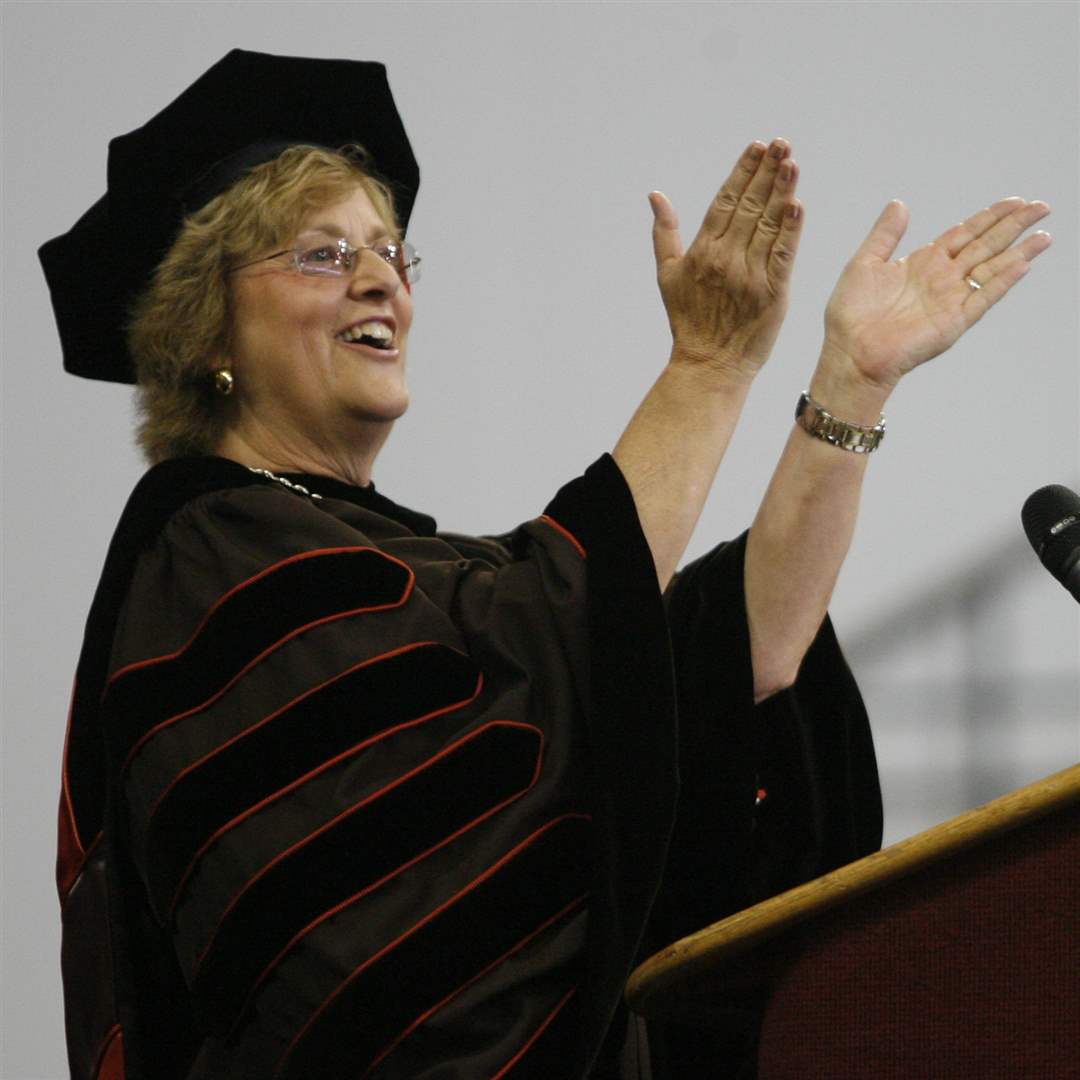 Dr-Mary-Ellen-Mazey-applauds-graduates