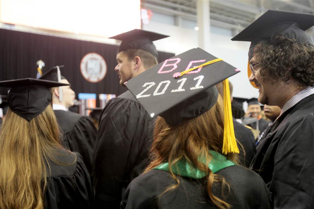 Student-stands-with-decorated-cap
