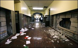 The second-floor hallway of the school has been left a mess in the wake of the auction of the school’s contents. Toledo Public Schools seeks a minimum bid of $395,000 for the property.