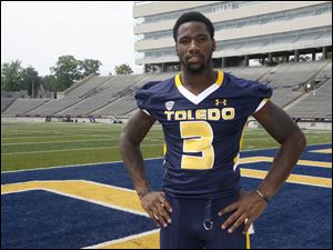 The Rockets' Cordale Scott will get to see his 2-year-old son more playing at Toledo instead of Illinois.