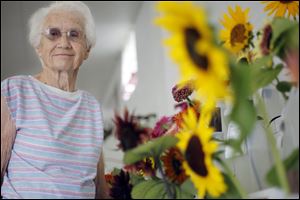 Ellen Farison, 84, a member of Trowel & Tractor Garden Club  who once tended to more than 90 varieties of flowers in her garden, said the peak time for garden club membership was in the 1970s. She has been in Trowel & Tractor since 1966.