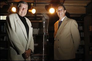 Tom Brady, left, and Steve Wronkowicz pose with equipment in Mr. Brady's basement studio. Mr. Brady said that he and his partner, Mr. Wronkowicz, began discussing the online radio-station project late last year.