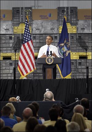 President Barack Obama speaks at Johnson Controls Inc. in Holland, Mich. 