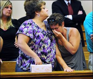 Family and friends of the slain Liske family react in court. Prosecutors Friday detailed the slayings.