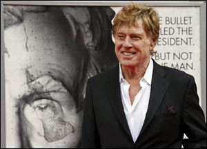 Robert Redford arrives at Ford’s Theatre in Washington for the premiere of his film ‘The Conspirator’ in April.