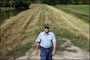 Geoff Sterne, whose 1,200-acre farm includes 750 in a floodplain, says that if a plan by the Army Corps of Engineers is carried out, 'it would kind of make us a dumping ground for everybody else.'