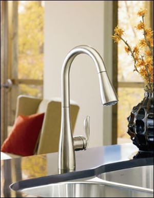 To streamline the sink, simplify this spot with multi-functional products like the new Arbor faucet from Moen. The faucet’s pulldown wand eliminates the need for a side spray and its single-hole mount offers a refined look without the clutter of additional handles.


