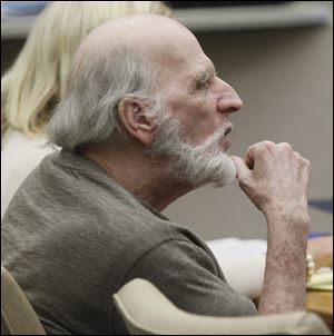 Robert Bowman listens to testimony during the trial. His defense is expected to begin presenting witnesses Friday.