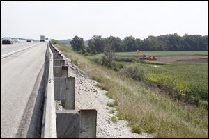 The turnpike’s chief engineer blames the soil for the crumbling embankments over State Rt. 19.