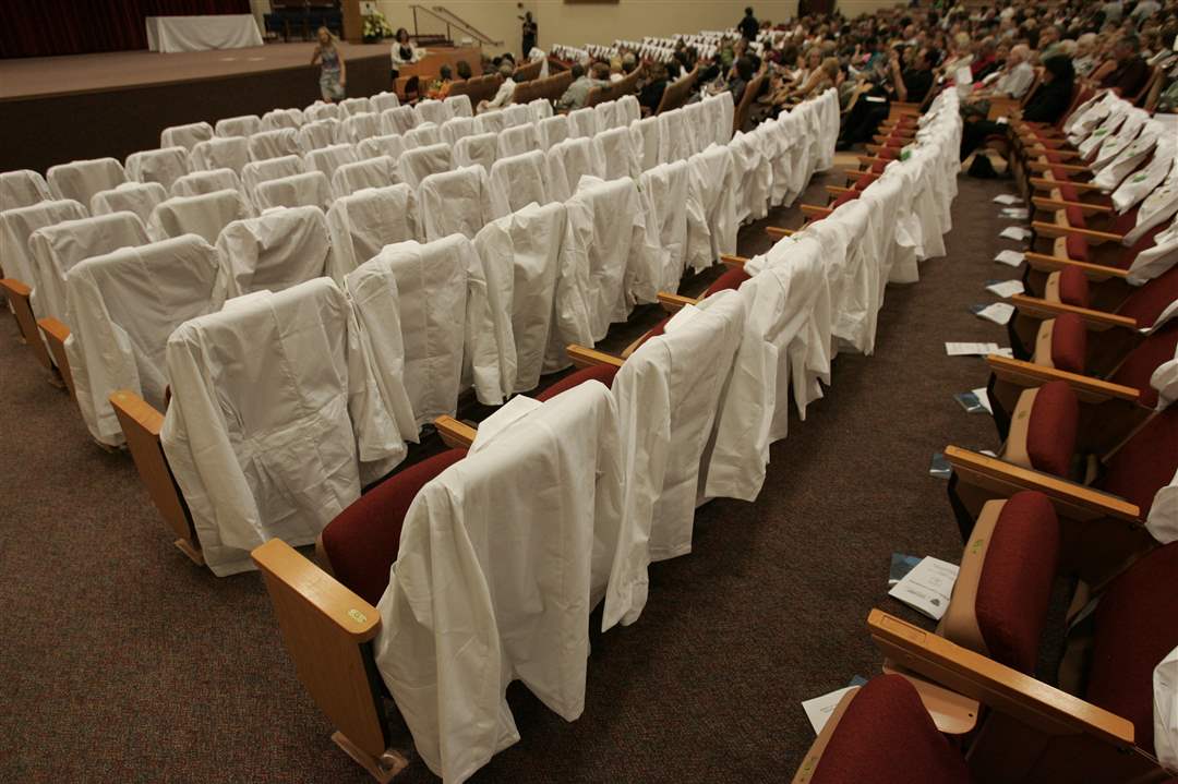 white-coats-on-chairs