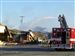 alexis-telegraph-fire-water.jpg Firefighters douse a "hot spot" on one of the businesses damaged in Tuesday's fire.