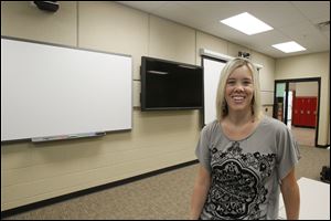 Rogers High School Principal Kelly Welch is shown in the school’s distance learning lab. More than 200 students have signed up to take classes in the labs.