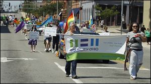 Equality Ohio was one of the many organizations that marched in Toledo’s Gay Pride Parade. It started at the intersection of South St. Clair and Washington streets and ended at Promenade Park.