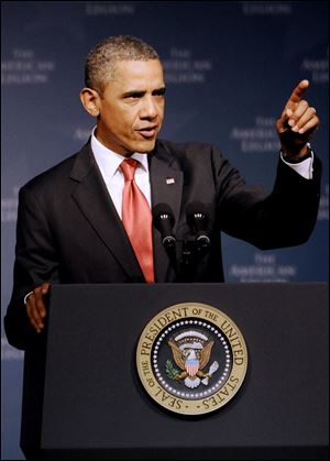 President Barack Obama addresses the national convention of the American Legion. Tuesday, Aug. 30, 2011, in Minneapolis.