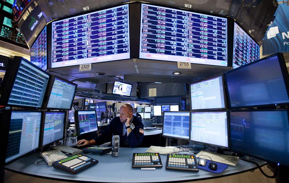 New-York-Stock-Exchange-trader-looks-at-screen