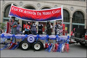 The United Auto Workers float during the Labor Day parade. A large turnout was expected  because of the SB 5 legislation that will appear on the Nov. 8 ballot.