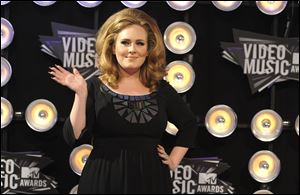 Adele arrives at the MTV Video Music Awards on Sunday Aug. 28, 2011, in Los Angeles.