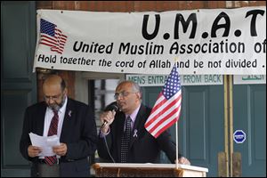People of interfaith attend the United Muslims Association Of Toledo's interfaith prayer service in observance of the 10th anniversary of Sept 11, 2001 at Toledo Muslim Community Center.