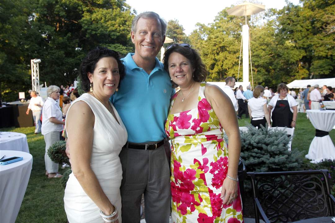 Rita-Mansour-left-Jerry-Anderson-and-Molly-Long-at-Art-and-Autism-event