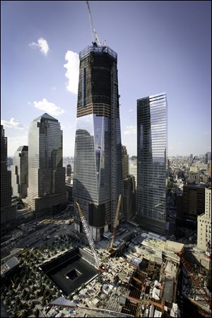 One World Trade Center and Seven World Trade Center rise adjacent to the site where the twin towers stood.